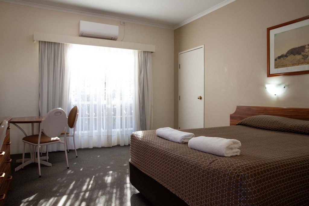 the kidman wayside inn brown patterned bedspread